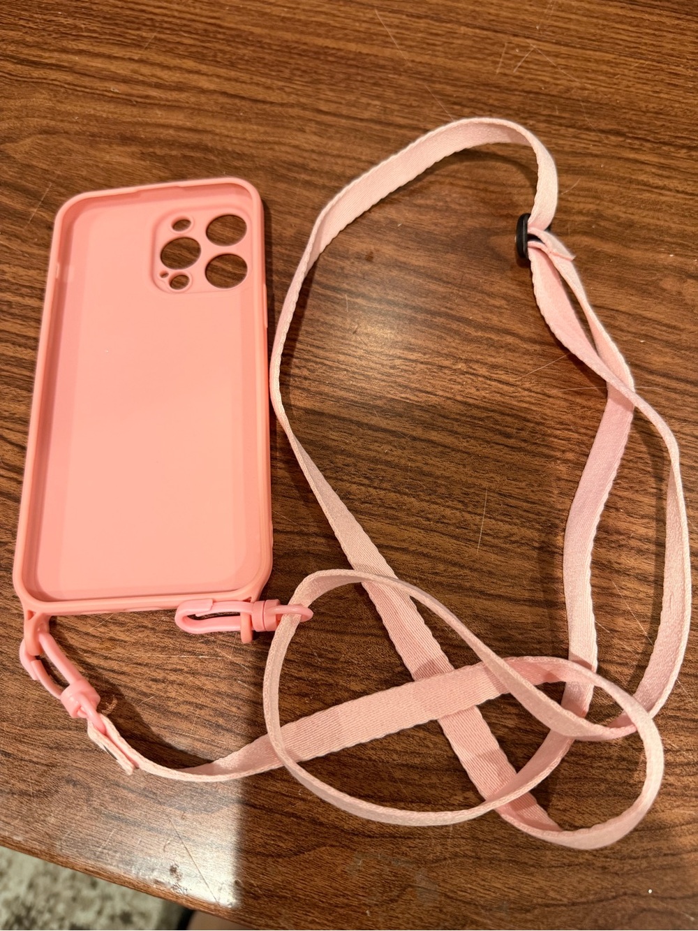 Pink iPhone 14 Pro Max Crossbody Case with Adjustable Strap